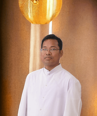 Dr. Fr. Jogesh B. Sangma, Principal